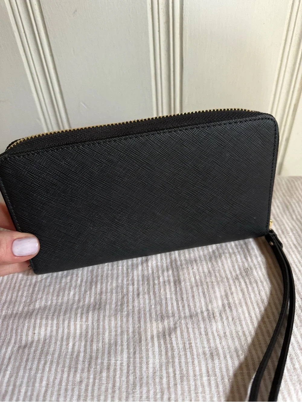 kate spade black zip-around wristlet wallet with gold logo